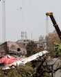 The wreckage of the Air India aircraft which crashed during take-off in Ahmedabad being lifted. (REUTERS) The wreckage of the Air India aircraft which crashed during take-off in Ahmedabad being lifted. (REUTERS)