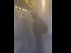 Most people inside the metro coach covered their faces with handkerchiefs and masks to avoid inhaling smoke. Most people inside the metro coach covered their faces with handkerchiefs and masks to avoid inhaling smoke.
