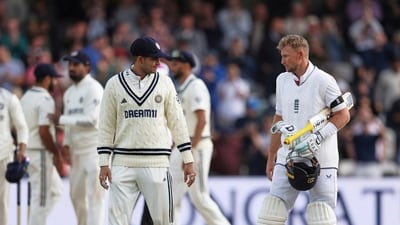England's Joe Root, right, interacts with India's captain Shubman Gill (AP)