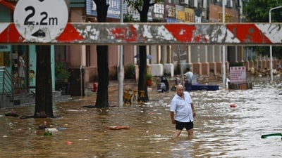Nearly 70,000 people in southern China were relocated days earlier after heavy flooding caused by Typhoon Wutip. (AFP) Nearly 70,000 people in southern China were relocated days earlier after heavy flooding caused by Typhoon Wutip. (AFP)