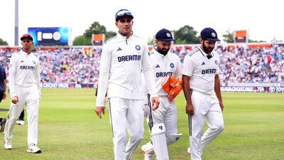 From left: India's Shubman Gill, Rishabh Pant and Shardul Thakur walk back after rain delays play (Reuters)