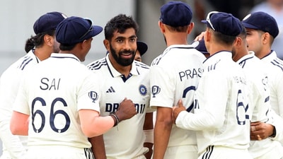 India's Jasprit Bumrah celebrates with teammates after taking the wicket of England's Zak Crawley, catch taken by Karun Nair (Action Images via Reuters)