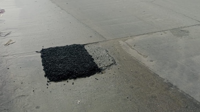 BBMP used tar to cover the damaged portions of a concrete road, a move that engineers and commuters alike say is both ineffective and short-lived. BBMP used tar to cover the damaged portions of a concrete road, a move that engineers and commuters alike say is both ineffective and short-lived.