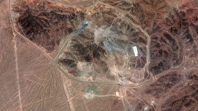 A satellite image shows Iran's Fordow enrichment facility, along with damage from the June 23 airstrikes. (Reuters)