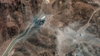 This handout satellite picture provided by Maxar Technologies shows new airstrike craters at perimeter installation on Iran's Fordow Fuel Enrichment Plant (FFEP) after US strikes. (AFP/Maxar Technologies ) This handout satellite picture provided by Maxar Technologies shows new airstrike craters at perimeter installation on Iran's Fordow Fuel Enrichment Plant (FFEP) after US strikes. (AFP/Maxar Technologies )