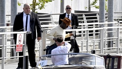 Corey Gamble boards a taxi boat as he arrives at Venice Marco Polo airport ahead of Jeff Bezos' wedding on June 25, 2025. (AFP) Corey Gamble boards a taxi boat as he arrives at Venice Marco Polo airport ahead of Jeff Bezos' wedding on June 25, 2025. (AFP)