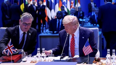 Britain's Prime Minister Keir Starmer and U.S. President Donald Trump attend a meeting of the North Atlantic Council (NAC) during a NATO summit in The Hague, Netherlands June 25, 2025.  REUTERS/Toby Melville (REUTERS)