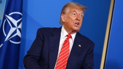 Hours before Powell's testimony on Tuesday, Trump wrote on his Truth Social platform that rates should be "at least two to three points lower." (AFP) Hours before Powell's testimony on Tuesday, Trump wrote on his Truth Social platform that rates should be "at least two to three points lower." (AFP)