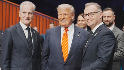President Donald Trump gestures poses with Norway's Prime Minister Jonas Gahr Store, left, and Poland's President Andrzej Duda during a plenary session at the NATO summit in The Hague, Netherlands, Wednesday, June 25, 2025. (AP Photo/Markus Schreiber) (AP) President Donald Trump gestures poses with Norway's Prime Minister Jonas Gahr Store, left, and Poland's President Andrzej Duda during a plenary session at the NATO summit in The Hague, Netherlands, Wednesday, June 25, 2025. (AP Photo/Markus Schreiber) (AP)