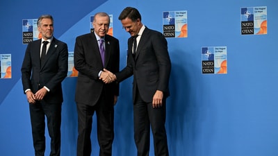 Turkey's President Recep Tayyip Erdogan, center, shakes hands with NATO Secretary General Mark Rutte as Netherlands' Prime Minister Dick Schoof looks on during the NATO summit in The Hague, Netherlands, Wednesday, June 25, 2025. (Ben Stansall/Pool Photo via AP) (AP) Turkey's President Recep Tayyip Erdogan, center, shakes hands with NATO Secretary General Mark Rutte as Netherlands' Prime Minister Dick Schoof looks on during the NATO summit in The Hague, Netherlands, Wednesday, June 25, 2025. (Ben Stansall/Pool Photo via AP) (AP)