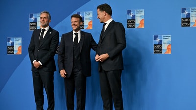 France's President Emmanuel Macron, center, poses for a picture with NATO Secretary General Mark Rutte, right, and Netherlands' Prime Minister Dick Schoof during the NATO summit in The Hague, Netherlands, Wednesday, June 25, 2025. (Ben Stansall/Pool Photo via AP) (AP) France's President Emmanuel Macron, center, poses for a picture with NATO Secretary General Mark Rutte, right, and Netherlands' Prime Minister Dick Schoof during the NATO summit in The Hague, Netherlands, Wednesday, June 25, 2025. (Ben Stansall/Pool Photo via AP) (AP)