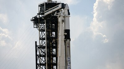The crew will travel to the orbiting laboratory on a new SpaceX Dragon spacecraft after launching on the company's Falcon 9 rocket. (REUTERS)