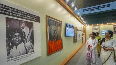 Visitors at an exhibition organised to mark the 50th anniversary of the Emergency imposed in 1975 by then PM Indira Gandhi in New Delhi on June 25. (PTI) Visitors at an exhibition organised to mark the 50th anniversary of the Emergency imposed in 1975 by then PM Indira Gandhi in New Delhi on June 25. (PTI)