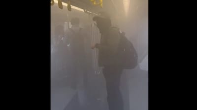 Most people inside the metro coach covered their faces with handkerchiefs and masks to avoid inhaling smoke. (Screengrab/X/@unplugged_yogi) Most people inside the metro coach covered their faces with handkerchiefs and masks to avoid inhaling smoke. (Screengrab/X/@unplugged_yogi)