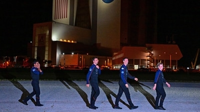 (L-R) ISRO astronaut Shubhanshu Shukla, Hungarian astronaut Tibor Kapu, US astronaut Peggy Whitson and Polish astronaut Slawosz Uznanski-Wisniewski make their way to Launch Complex 39A ahead of the Axiom-4 mission, with a SpaceX Dragon spacecraft and Falcon 9 rocket (AFP) (L-R) ISRO astronaut Shubhanshu Shukla, Hungarian astronaut Tibor Kapu, US astronaut Peggy Whitson and Polish astronaut Slawosz Uznanski-Wisniewski make their way to Launch Complex 39A ahead of the Axiom-4 mission, with a SpaceX Dragon spacecraft and Falcon 9 rocket (AFP)