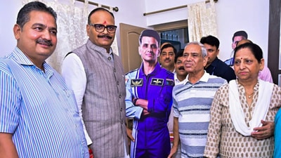 In this handout image released on June 25, 2025, Uttar Pradesh Deputy Chief Minister Brajesh Pathak meets family members of Indian Air Force (IAF) Group Captain Shubhanshu Shukla (Handout/PTI) In this handout image released on June 25, 2025, Uttar Pradesh Deputy Chief Minister Brajesh Pathak meets family members of Indian Air Force (IAF) Group Captain Shubhanshu Shukla (Handout/PTI)