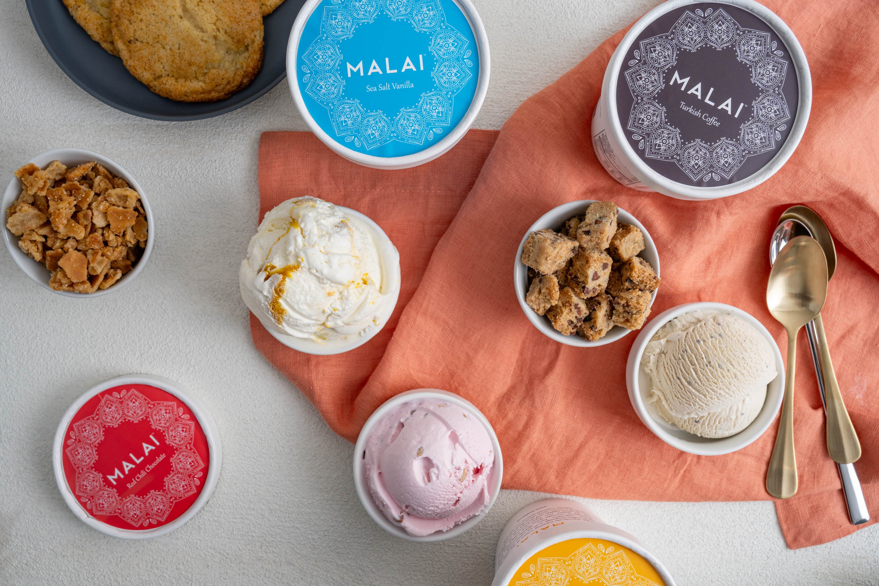 “The cities where we have scoop shops have long been defined by the cultural fabric – and food is one of the most powerful ways that shows up. Malai fits into that tradition by taking something familiar, like ice cream, and reimagining it through the lens of South Asian ingredients and memories,” Bavishi says. (Courtesy Malai / Morgan Ione Photography) “The cities where we have scoop shops have long been defined by the cultural fabric – and food is one of the most powerful ways that shows up. Malai fits into that tradition by taking something familiar, like ice cream, and reimagining it through the lens of South Asian ingredients and memories,” Bavishi says. (Courtesy Malai / Morgan Ione Photography)