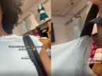 A woman’s melted bag clings to her shirt as NYC heatwave pushes temperatures to 99°F.