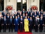 President Donald Trump, along with the King Willem-Alexander and Queen Maxima of the Netherlands, poses for a family photo as he participates in the 2025 NATO summit in The Hague, on Tuesday, June 24, 2025. Haiyun Jiang/Pool via REUTERS