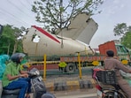 A truck carrying wreckage of the Air India plane that recently crashed into a medical hostel and its canteen complex passes by, in Ahmedabad, Gujarat, Sunday, June 22, 2025. A truck carrying wreckage of the Air India plane that recently crashed into a medical hostel and its canteen complex passes by, in Ahmedabad, Gujarat, Sunday, June 22, 2025.