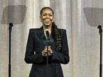 In a podcast, Michelle Obama dismissed divorce rumors and admitted absence from crucial events. (Photo by Shannon Finney / GETTY IMAGES NORTH AMERICA / Getty Images via AFP)