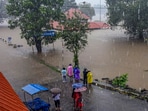 Ernakulam: Pedestrians look on as the water level of the Periyar river increased following heavy rainfall, at Aluva in Ernakulam district of Kerala, Thursday, June 26, 2025. Ernakulam: Pedestrians look on as the water level of the Periyar river increased following heavy rainfall, at Aluva in Ernakulam district of Kerala, Thursday, June 26, 2025.