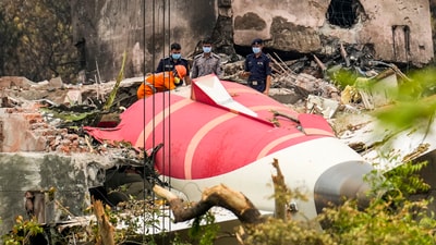 Ahmedabad: Wreckage of the crashed Air India plane being lifted through a crane, in Ahmedabad, Gujarat, (PTI) Ahmedabad: Wreckage of the crashed Air India plane being lifted through a crane, in Ahmedabad, Gujarat, (PTI)