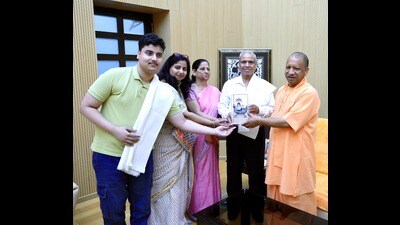 CM Yogi Adityanath meets Astronaut Shubhanshu Shukla’s parents at his 5 Kalidas official residence in Lucknow, on Thursday (HT)