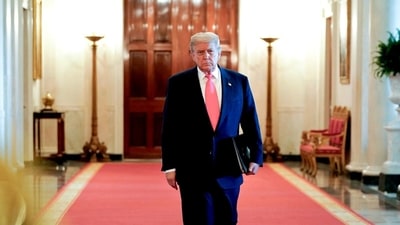 US President Donald Trump arrives to speak in the East Room of the White House in Washington, DC, US, on Thursday, June 26, 2025. (Bloomberg) US President Donald Trump arrives to speak in the East Room of the White House in Washington, DC, US, on Thursday, June 26, 2025. (Bloomberg)