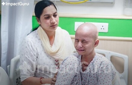 [In frame: Sneha’s mother trying to comfort her]