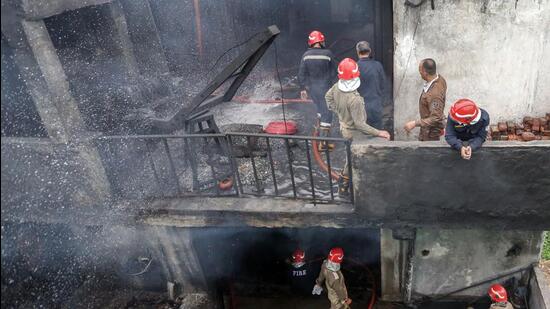 It was so severe, and the building was located in a cramped lane, that it took over 100 firefighters 13 hours to quell the blaze. (Sanjeev Verma/HT Photo)