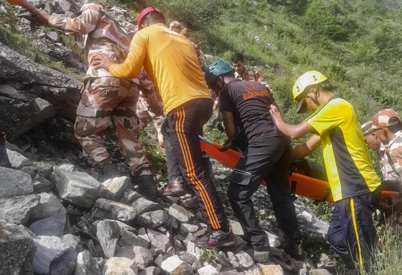 Rudraprayag: SDRF personnel carry out rescue work after a tempo traveller carrying pilgrims fell into the Alaknanda River, in Rudraprayag district, (PTI)
