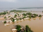 A general view of a flooded area after heavy monsoon rains is pictured from atop a bridge in Charsadda district in the Khyber Pakhtunkhwa.