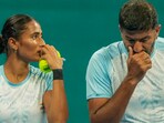 India's Rohan Bopanna and Rutuja Sampatrao Bhosale during the Mixed Doubles Final tennis match India's Rohan Bopanna and Rutuja Sampatrao Bhosale during the Mixed Doubles Final tennis match