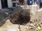 The 10-foot-deep pit from where the victim's body was recovered by police, in Faridabad on June 21. The 10-foot-deep pit from where the victim's body was recovered by police, in Faridabad on June 21.