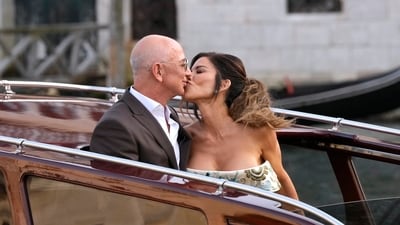 Jeff Bezos, center left, and Lauren Sanchez, center right, kiss as they leave a hotel for their pre wedding reception, in Venice, Italy, Thursday, June 26, 2025. (AP) Jeff Bezos, center left, and Lauren Sanchez, center right, kiss as they leave a hotel for their pre wedding reception, in Venice, Italy, Thursday, June 26, 2025. (AP)
