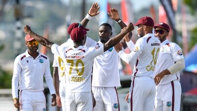West Indies vs Australia, 1st Test: Windies coach Daren Sammy met match referee Javagal Srinath following contentious umpiring. (AFP) West Indies vs Australia, 1st Test: Windies coach Daren Sammy met match referee Javagal Srinath following contentious umpiring. (AFP)