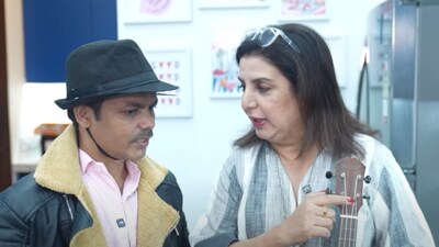 Farah Khan with her cook Dilip in their recent cooking vlog. Farah Khan with her cook Dilip in their recent cooking vlog.