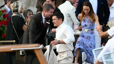 Orlando Bloom and guest get on a taxi boat at the Gritti Palace Hotel ahead of the wedding of Amazon's founder Jeff Bezos with Lauren Sanchez in Venice on June 26, 2026. (AFP) Orlando Bloom and guest get on a taxi boat at the Gritti Palace Hotel ahead of the wedding of Amazon's founder Jeff Bezos with Lauren Sanchez in Venice on June 26, 2026. (AFP)
