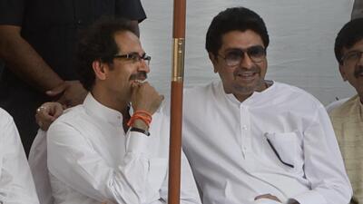 Mumbai, India - November 17, 2014: Maharashtra Navnirman Sena (MNS) Chief Raj Thackeray along with Shiv Sena Chief Uddhav Thackeray at the Bal Thackeray Memorial at Shivaji, Park, Dadar, Mumbai, India on Monday, November 17, 2014 on Bal Thackeray's 2nd death anniversary. (Photo by Kalpak Pathak / hIndustan Times) (Hindustan Times) Mumbai, India - November 17, 2014: Maharashtra Navnirman Sena (MNS) Chief Raj Thackeray along with Shiv Sena Chief Uddhav Thackeray at the Bal Thackeray Memorial at Shivaji, Park, Dadar, Mumbai, India on Monday, November 17, 2014 on Bal Thackeray's 2nd death anniversary. (Photo by Kalpak Pathak / hIndustan Times) (Hindustan Times)
