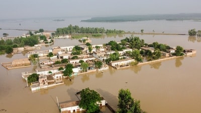 A general view of a flooded area after heavy monsoon rains is pictured from atop a bridge in Charsadda district in the Khyber Pakhtunkhwa. (AFP)