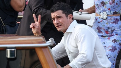 Orlando Bloom gestures as he leaves Gritti Palace Hotel, ahead of the anticipated wedding of Amazon founder Jeff Bezos and journalist Lauren Sanchez in Venice, Italy, June 26, 2025. (REUTERS)