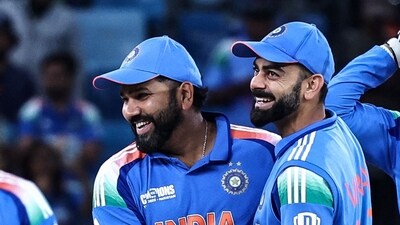 India's Rohit Sharma (L) and his teammate Virat Kohli (R) celebrate (AFP) India's Rohit Sharma (L) and his teammate Virat Kohli (R) celebrate (AFP)