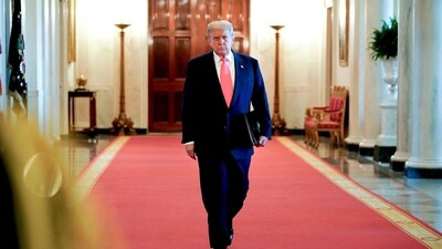 US President Donald Trump arrives to speak in the East Room of the White House in Washington, DC, US, on Thursday, June 26, 2025. (Bloomberg) US President Donald Trump arrives to speak in the East Room of the White House in Washington, DC, US, on Thursday, June 26, 2025. (Bloomberg)