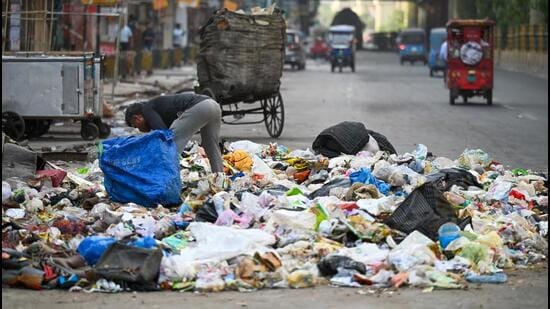 Noida, India- June 05, 2025: Pile of garbage on the road of Atta Market Sector 27, in Noida, India, on Thursday, June 05, 2025. (Photo by Sunil Ghosh / Hindustan Times)