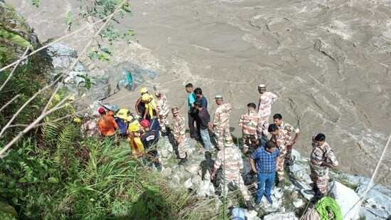 Teams from the police, fire department, State Disaster Response Force and locals reached the site to assist with the search and rescue operations. (HT Photo)