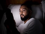 Do you scroll your phone or go to bed feeling stressed? Here's why you should avoid these. (Freepik)
