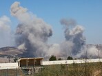 Smoke billows from the Nabatieh district, following Israeli strikes, as seen from Marjayoun, in southern Lebanon on June 27, 2025. 
