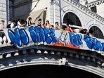 People hang a banner 'No Space for Bezos' on the Rialto Bridge during a protest a day after the wedding ceremony of Jeff Bezos and Lauren Sanchez in Venice,  on June 28, 2025.