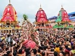 Devotees participate in the Rath Yatra of Lord Jagannath, in Puri.
